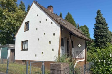 Charmantes freistehendes Einfamilienhaus mit Garten, Garage und viel Potenzial